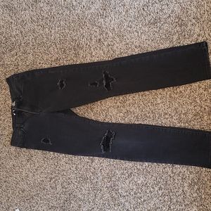 Black jeans with holes